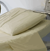 Illustration showing close-up of a hospital bed on a ward